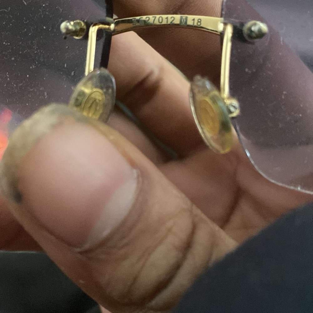 Cartier Rimless Glasses with Gold Accents